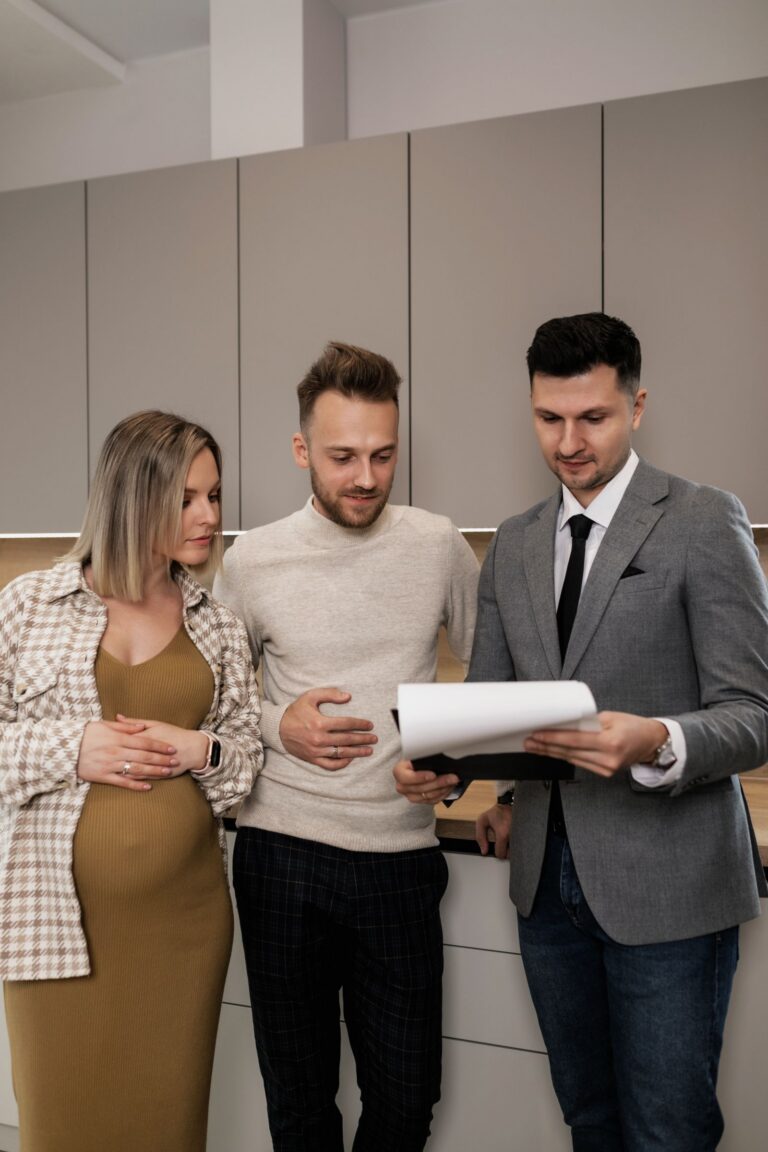 Business professionals reviewing a commercial cleaning contract together in a modern Maine office